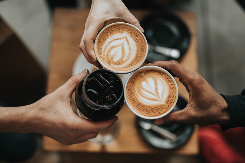 A warm mug of coffee on a kitchen table at dawn